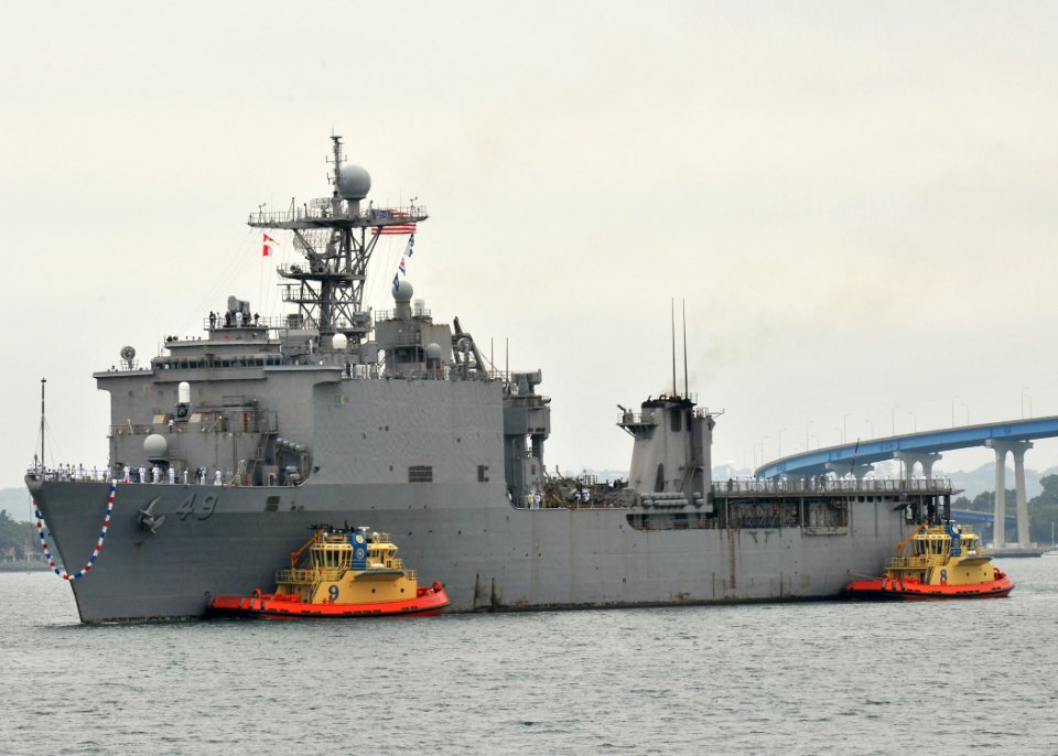 US Navy 110610-N-ZZ999-017 Sailors aboard the amphibious dock landing ship USS Harpers Ferry (LSD 49) man the rails while arriving at Naval Base Sa