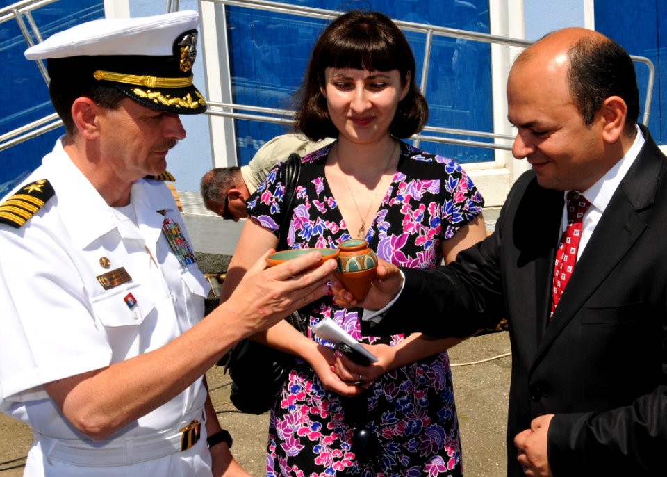 US Navy 110609-N-YM590-130 Capt. John M. Dorey, left, and Robert Chkhaimze toast during a welcoming ceremony for USS Anzio (CG 68)