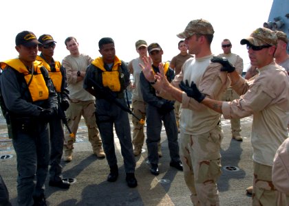 US Navy 110612-N-VY256-139 Sailors assigned to the guided-missile destroyer USS Howard (DDG 83) share best practices with a Royal Malaysian Navy vi