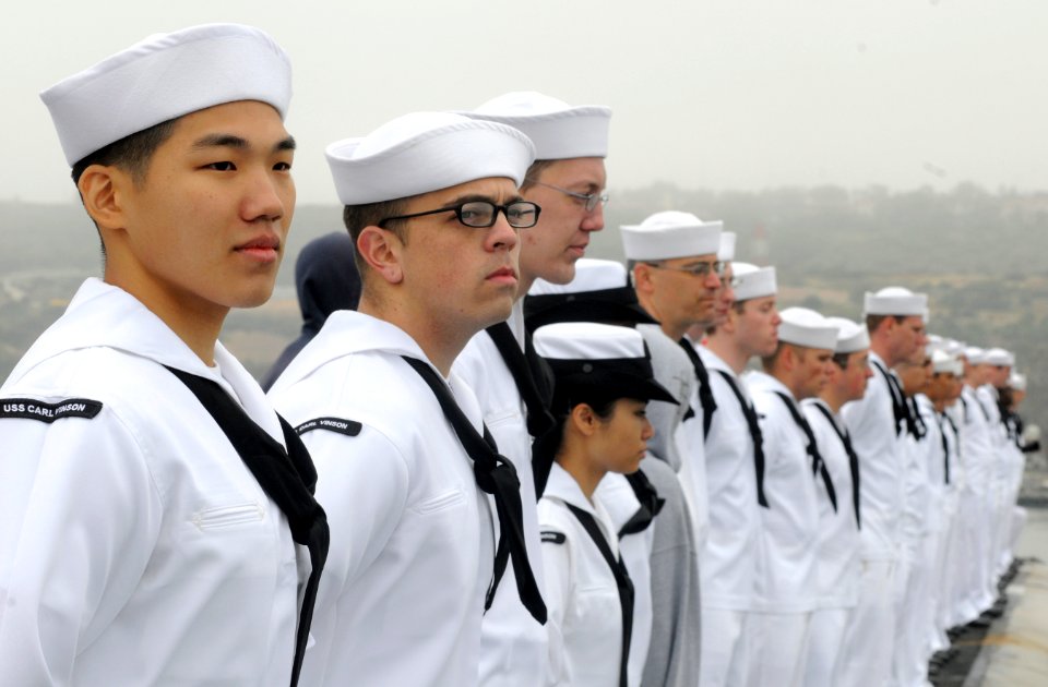 US Navy 110615-N-GZ277-161 Sailors man the rails as the Nimitz-class aircraft carrier USS Carl Vinson (CVN 70) returns to homeport at Naval Base Co