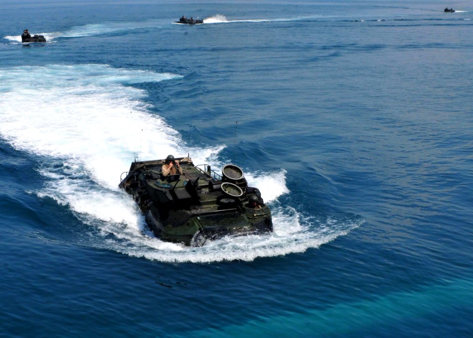 US Navy 110612-N-XR557-179 An amphibious assault vehicle approaches the amphibious dock landing ship USS Tortuga (LSD 46), not pictured, after a Co