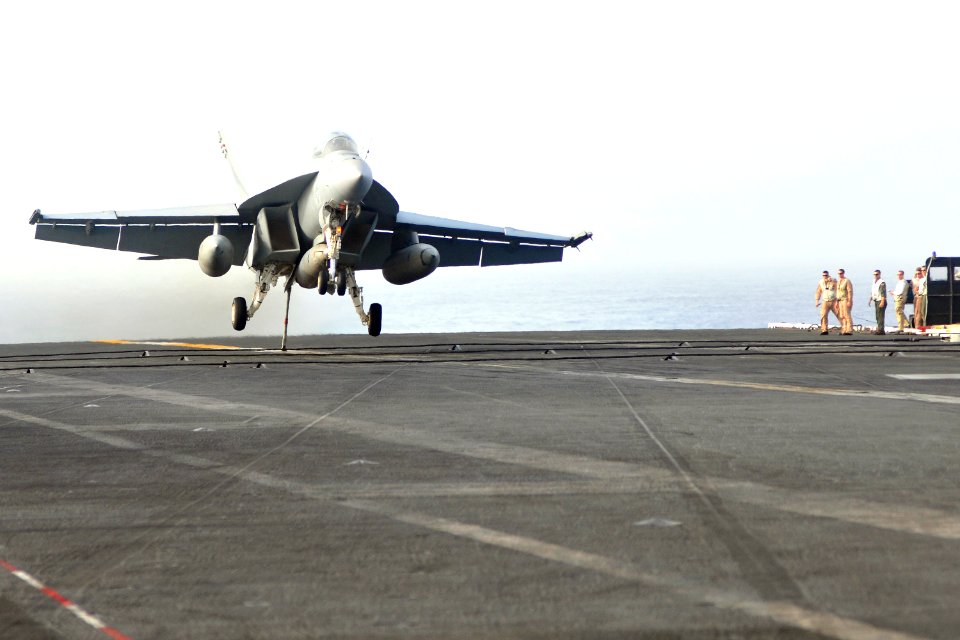 US Navy 110612-N-EE987-388 An F-A-18E Super Hornet prepares to make an arrested recovery on the flight deck aboard USS Ronald Reagan (CVN 76)