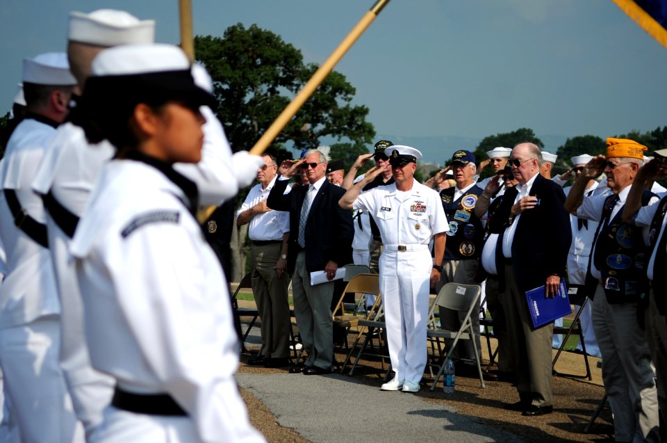 US Navy 110613-N-AD372-418 Master Chief Petty Officer of the Navy (MCPON) Rick D. West salutes the Asmerican flag at a wreath laying ceremony at Ch