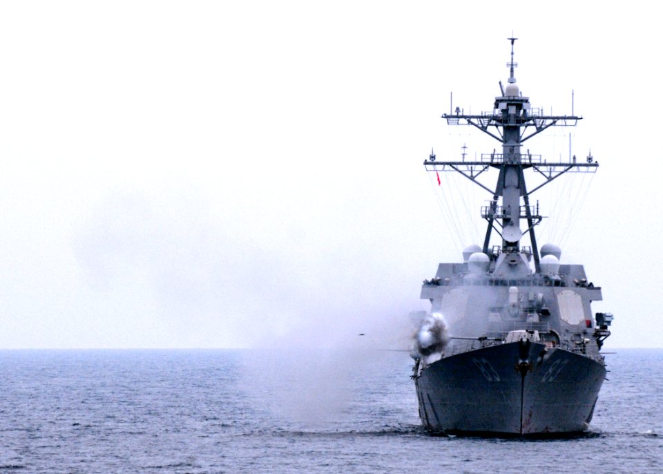 US Navy 110611-N-SP676-566 The guided-missile destroyer USS Howard (DDG 83) fires its 5-Inch-54-caliber (Mk 45) lightweight gun during a Cooperatio
