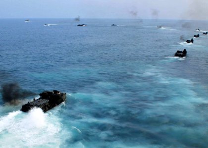 US Navy 110613-N-XR557-109 Amphibious assault vehicles launched from the amphibious dock landing ship USS Tortuga (LSD 46) conduct an amphibious la photo