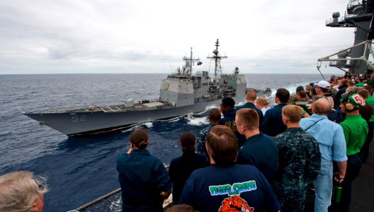 US Navy 110612-N-TU221-387 Sailors, friends and family gather on the flight deck of the Nimitz-class aircraft carrier USS Carl Vinson (CVN 70) as t