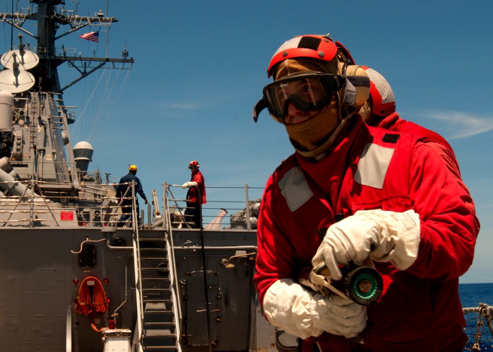 US Navy 110614-N-EA192-042 Machinery Repairman 2nd Class Carmen Vescio, assigned to the engineering department of the guided-missile destroyer USS