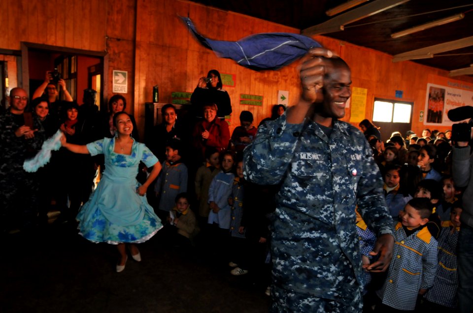 US Navy 110613-N-NL541-730 Seaman Francis Miliswa, assigned to the guided-missile frigate USS Boone (FFG 28), participates in a traditional Chilean