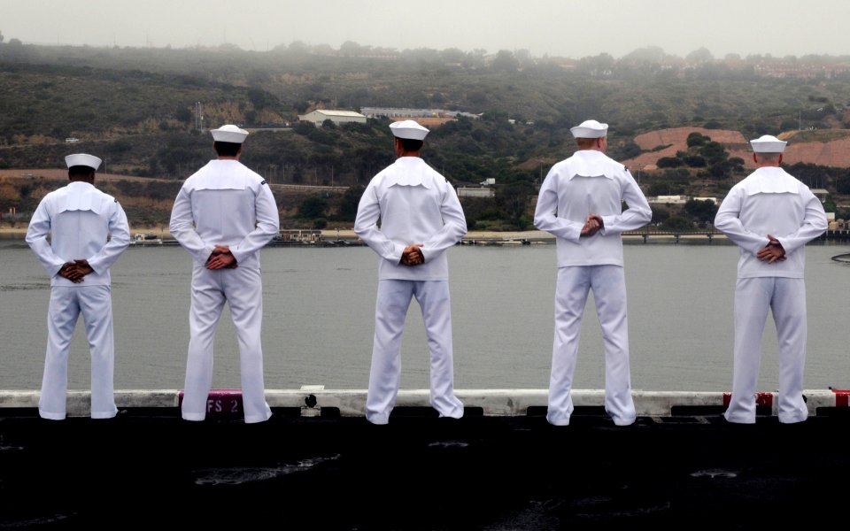 US Navy 110615-N-GZ277-140 Sailors man the rails as the Nimitz-class aircraft carrier USS Carl Vinson (CVN 70) returns to homeport at Naval Base Co