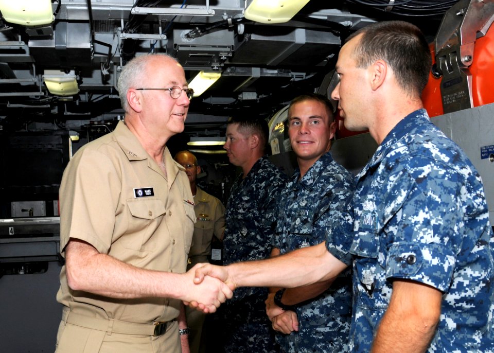 US Navy 110613-N-UK333-034 Rear Adm. Mark Tidd, Chief of Chaplains, speaks with submariners during a tour aboard the Virginia-class submarine USS H