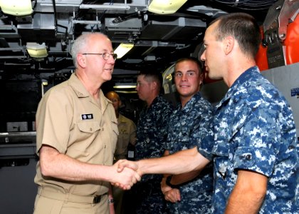 US Navy 110613-N-UK333-034 Rear Adm. Mark Tidd, Chief of Chaplains, speaks with submariners during a tour aboard the Virginia-class submarine USS H