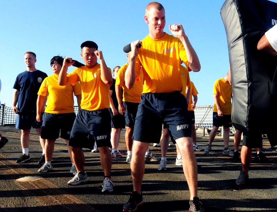 US Navy 110615-N-NR955-062 Sailors aboard USS Bulkeley (DDG 84) prepare for the obstacle course to complete level one self-defense training on the