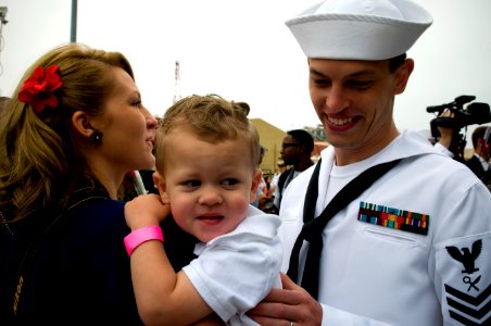 US Navy 110615-N-MD252-225 Intelligence Specialist 1st Class Kyle Cook is welcomed home by family members after USS Carl Vinson (CVN 70) returned t