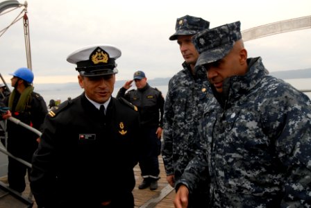 US Navy 110614-N-ZI300-016 Cmdr. Roy Love, commanding officer of the guided-missile frigate USS Boone (FFG 28) is greeted by senior leadership of t