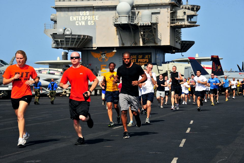 US Navy 110617-N-OP638-024 Sailors aboard USS Enterprise (CVN 65) participate in a 5K run on the ship's flight deck