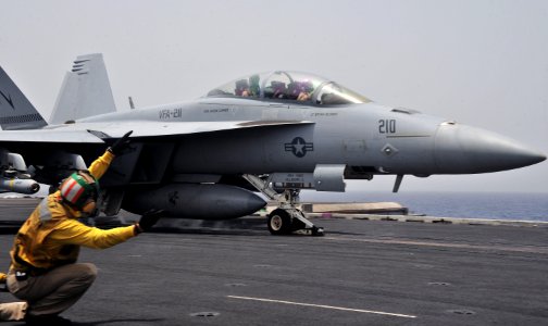 US Navy 110620-N-OP638-047 An F-A-18E Super Hornet assigned to the Checkmates of Strike Fighter Squadron (VFA) 211 launches from the aircraft carri