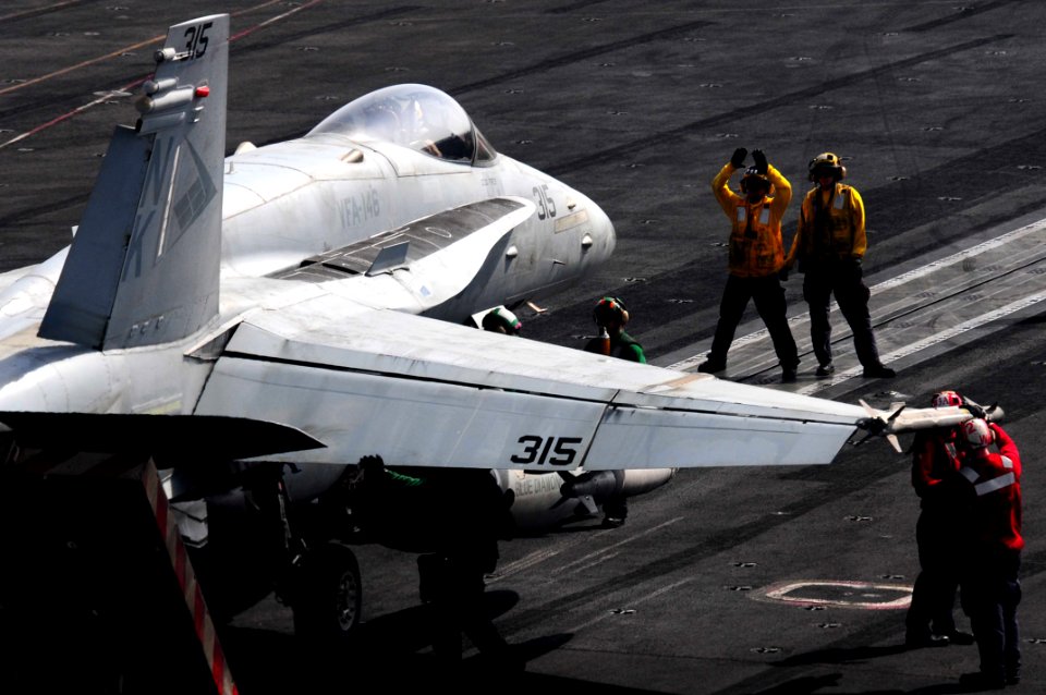 US Navy 110618-N-UO379-071 An F-A-18C Hornet prepares to launch from USS Ronald Reagan (CVN 76)