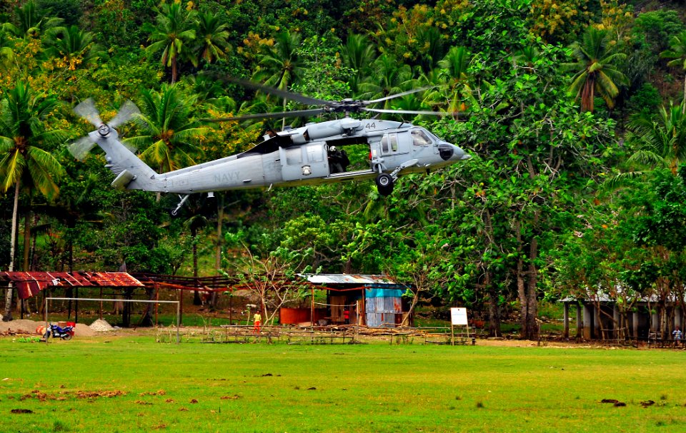 US Navy 110621-N-KB563-695 An MH-60S Sea Hawk helicopter prepares to land at a community relations project at Iliomar village