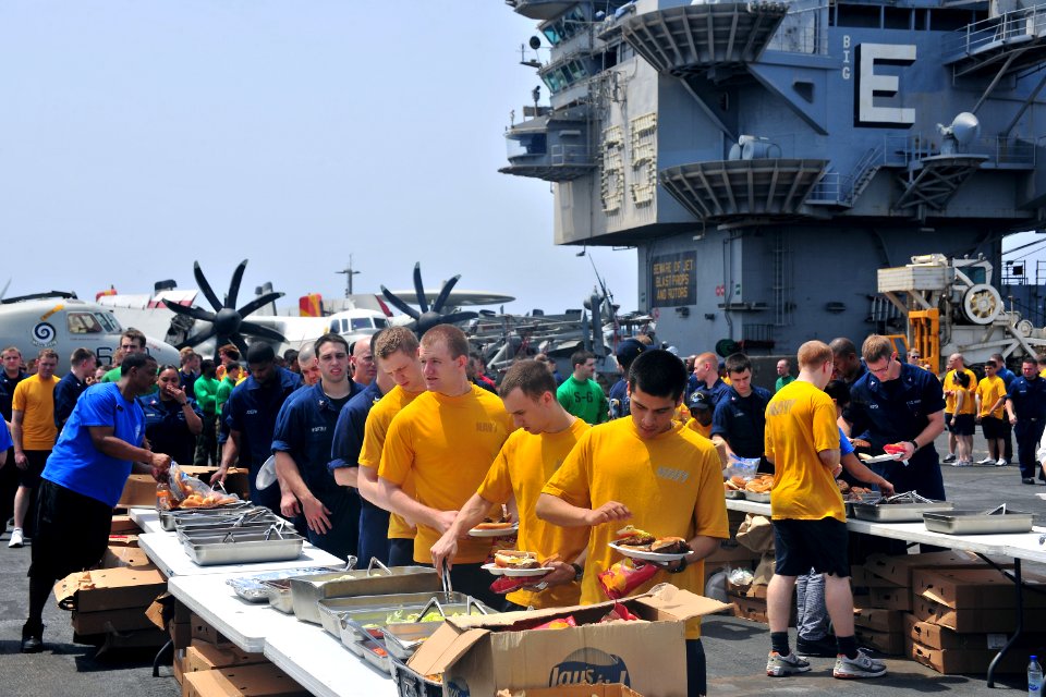 US Navy 110622-N-OP638-099 Sailors aboard USS Enterprise (CVN 65) participate in a steel beach picnic on the ship's flight deck