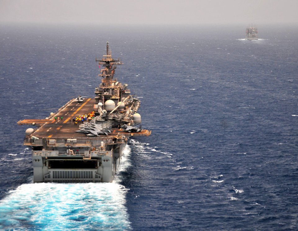 US Navy 110620-N-ZS026-144 The amphibious assault ship USS Boxer (LHD 4) approaches the Military Sealift Command dry cargo and ammunition ship USNS