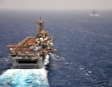 US Navy 110620-N-ZS026-144 The amphibious assault ship USS Boxer (LHD 4) approaches the Military Sealift Command dry cargo and ammunition ship USNS