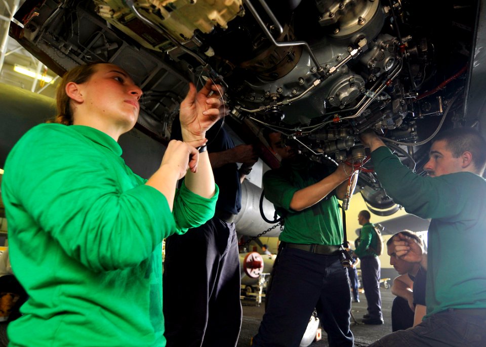 US Navy 110621-N-EE987-071 Aviation structural mechanics prepare an EA-6B Prowler for an engine swap in the hangar bay of USS Ronald Reagan (CVN 76