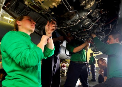 US Navy 110621-N-EE987-071 Aviation structural mechanics prepare an EA-6B Prowler for an engine swap in the hangar bay of USS Ronald Reagan (CVN 76