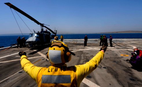 US Navy 110621-N-OS574-236 Sailors participate in flight deck drills aboard USS Mesa Verde (LPD 19)