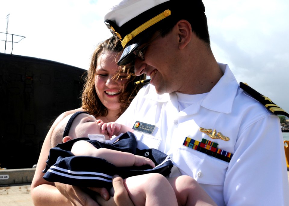 US Navy 110622-N-UK333-068 Lt. Paul Galatro meets his daughter for the first time as USS Pasadena (SSN 752) returns to Joint Base Pearl Harbor-Hick