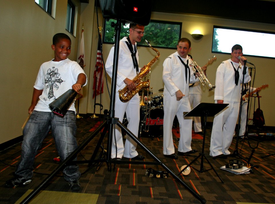 US Navy 110620-N-ZL585-132 A child performs with the Navy Band Great Lakes,