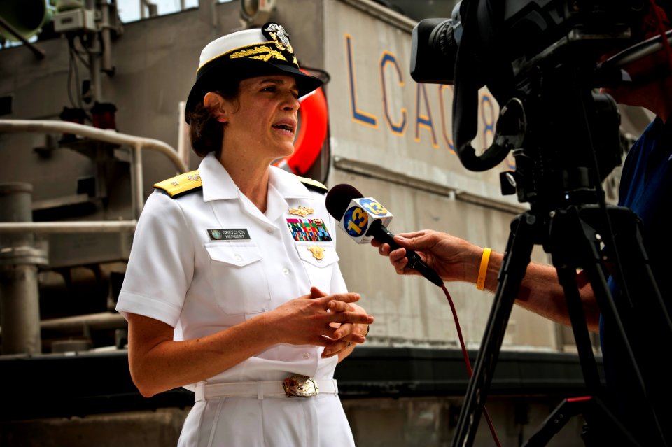 US Navy 110622-N-KK576-062 Rear Adm. Gretchen S. Herbert gives an interview to a news reporter after the Navy Cyber Forces change of command ceremo