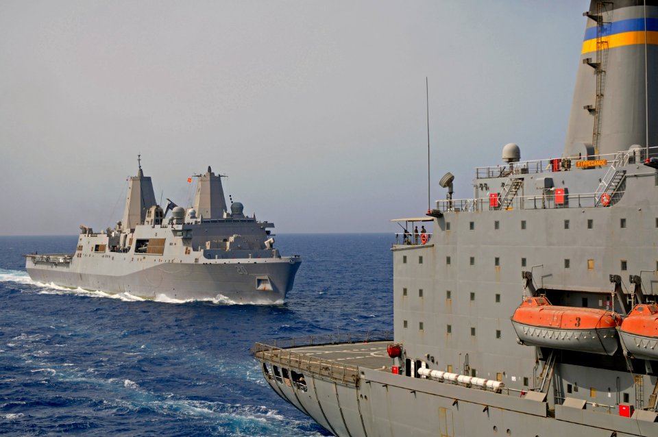 US Navy 110621-N-RC734-249 USS Green Bay (LPD 20), left, makes its approach alongside USNS Tippecanoe (T-AO 199) to participate in a replenishment