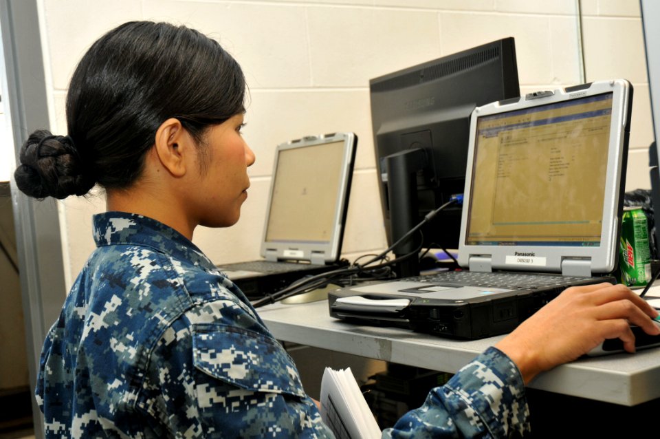 US Navy 110623-N-GO535-563 Aviation Maintenance Administrationman 2nd Class Linda Le, assigned to the Fighting Omars of Fighter Squadron Composite