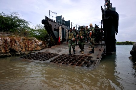 US Navy 110622-N-YO394-131 Sailors assigned to Riverine Squadron (RIVRON) 3 disembark a Royal Netherlands Navy landing craft utility (LCU)