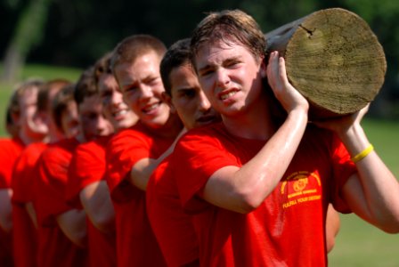 US Navy 110621-N-OA833-004 High school students conduct log physical training during the 2011 U.S. Naval Academy Summer Seminar Sea Trials