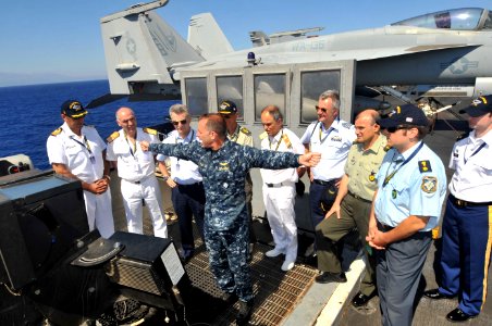 US Navy 110625-N-CH661-117 Rear Adm. Terry B. Kraft, commander of the Enterprise Carrier Strike Group, shows military officials from Greece the lan
