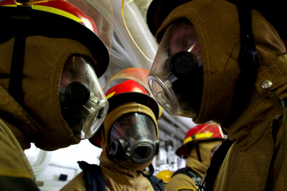 US Navy 110623-N-ZC343-004 Sailors on the hose team aboard USS Bonhomme Richard (LHD 6) prepare to take part in a main space fire drill