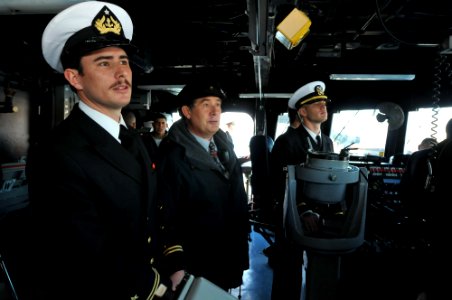 US Navy 110624-N-NL541-097 Chilean navy retired Rear Adm. Ellis Berg, middle, acts as the local pilot for the guided-missile frigate USS Thach (FFG