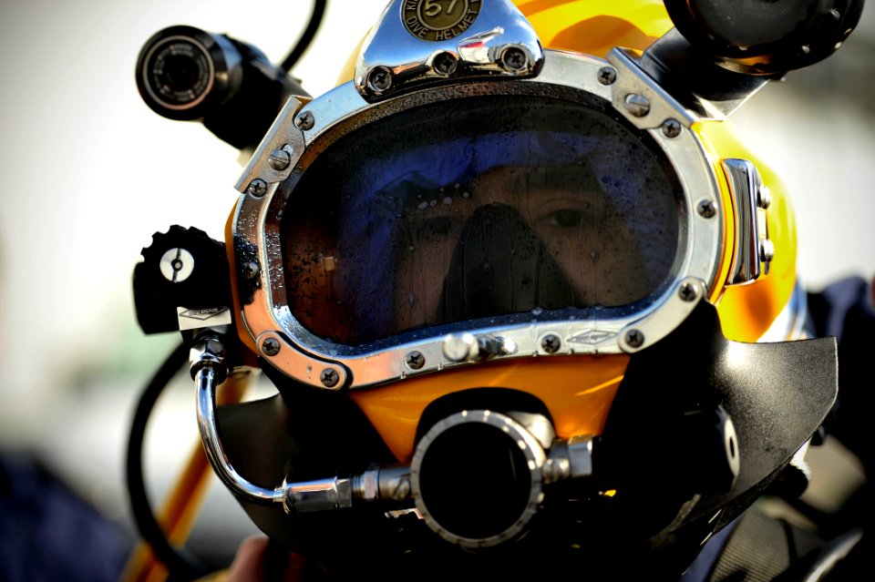 US Navy 110622-N-KB666-198 Armada de Chile sailor John Ramon, demonstrates Chilean navy dive gear to members of Mobile Diving and Salvage Unit (MD