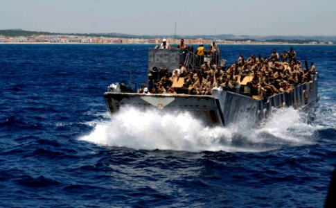 US Navy 110627-N-OS574-084 A landing craft utility prepares to off-load passengers and equipment onto USS Mesa Verde (LPD 19)