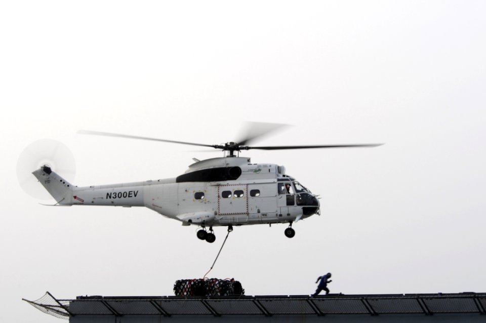 US Navy 110622-N-XQ375-361 A Sailor aboard the Military Sealift Command dry cargo and ammunition ship USNS Alan Shepherd (T-AKE 3) clears the fligh