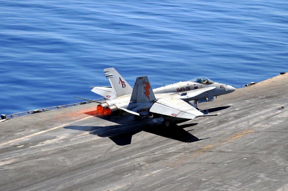US Navy 110627-N-CH661-007 An F-A-18C Hornet assigned to the Thunderbolts of Marine Fighter Attack Squadron (VMFA) 251 launches from catapult four