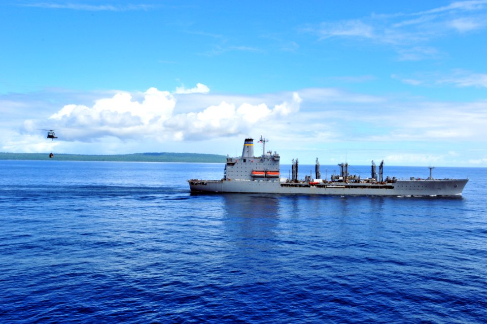 US Navy 110627-N-ZF681-145 An MH-60 Sea Hawk helicopter carries supplies from USNS Rappahannock (T-AO 204)