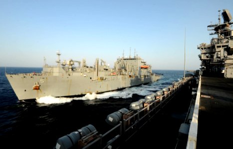 US Navy 110625-N-EC658-002 The Military Sealift Command dry cargo and ammunition ship USNS Robert E. Peary (T-AKE 5) steams alongside the multipurp