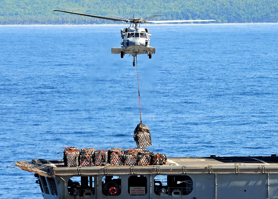 US Navy 110627-F-HS649-274 An MH-60S Sea Hawk helicopter transfers stores from USNS Rappahannock (T-AO 204)