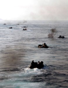 US Navy 110628-N-GH121-006 Amphibious assault vehicles carry Marines from the 22nd Marine Expeditionary Unit (22nd MEU)