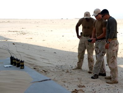 US Navy 110629-N-YX920-062 Sailors test remote detonators during explosive ordnance disposal training for counter-improvised explosive device opera