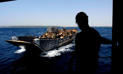 US Navy 110627-N-OS574-088 A landing craft utility assigned to Assault Craft Unit (ACU) 2 prepares to off-load passengers and equipment onto the Sa
