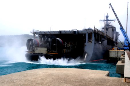 US Navy 110627-N-WV964-047 A landing craft air cushion departs the well deck of the forward-deployed dock landing ship USS Germantown (LSD 42)