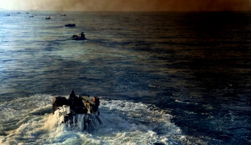 US Navy 110628-N-AG285-064 Amphibious assault vehicles assigned to the 22nd Marine Expeditionary Unit (22nd MEU) depart the amphibious dock landing